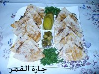 الخبرز المحشي بحمسة الباذنجان2.jpg