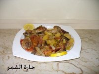 أفخاذ الدجاج بالبصل الأخضر.jpg